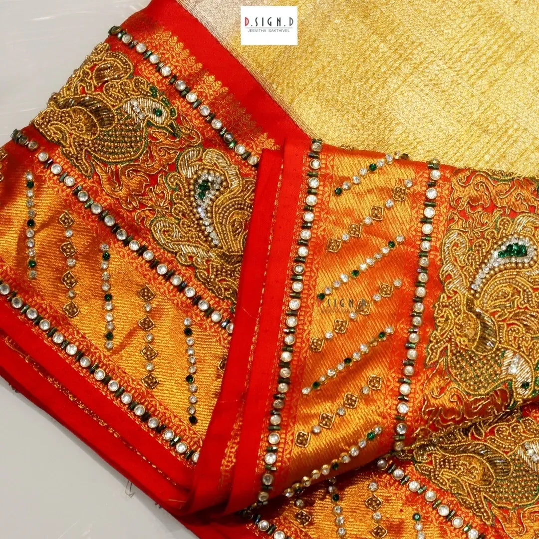 Gold Kanjeevaram embroidered silk saree