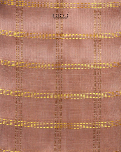 A close-up of a copper shade woven fabric with a subtle grid texture and horizontal metallic gold stripes.