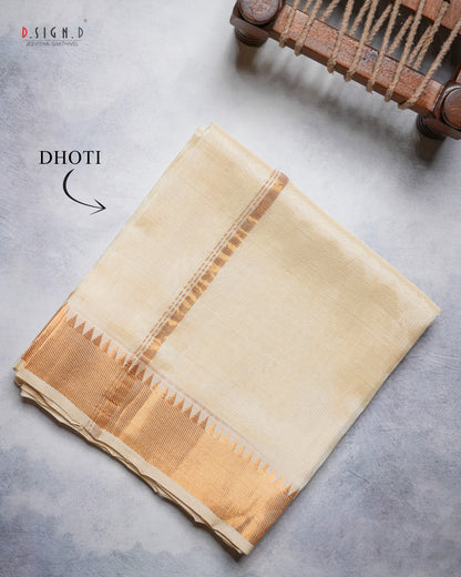 A folded cream-colored pure silk body with a metallic gold border, displayed on a textured gray surface next to a wooden loom frame. 