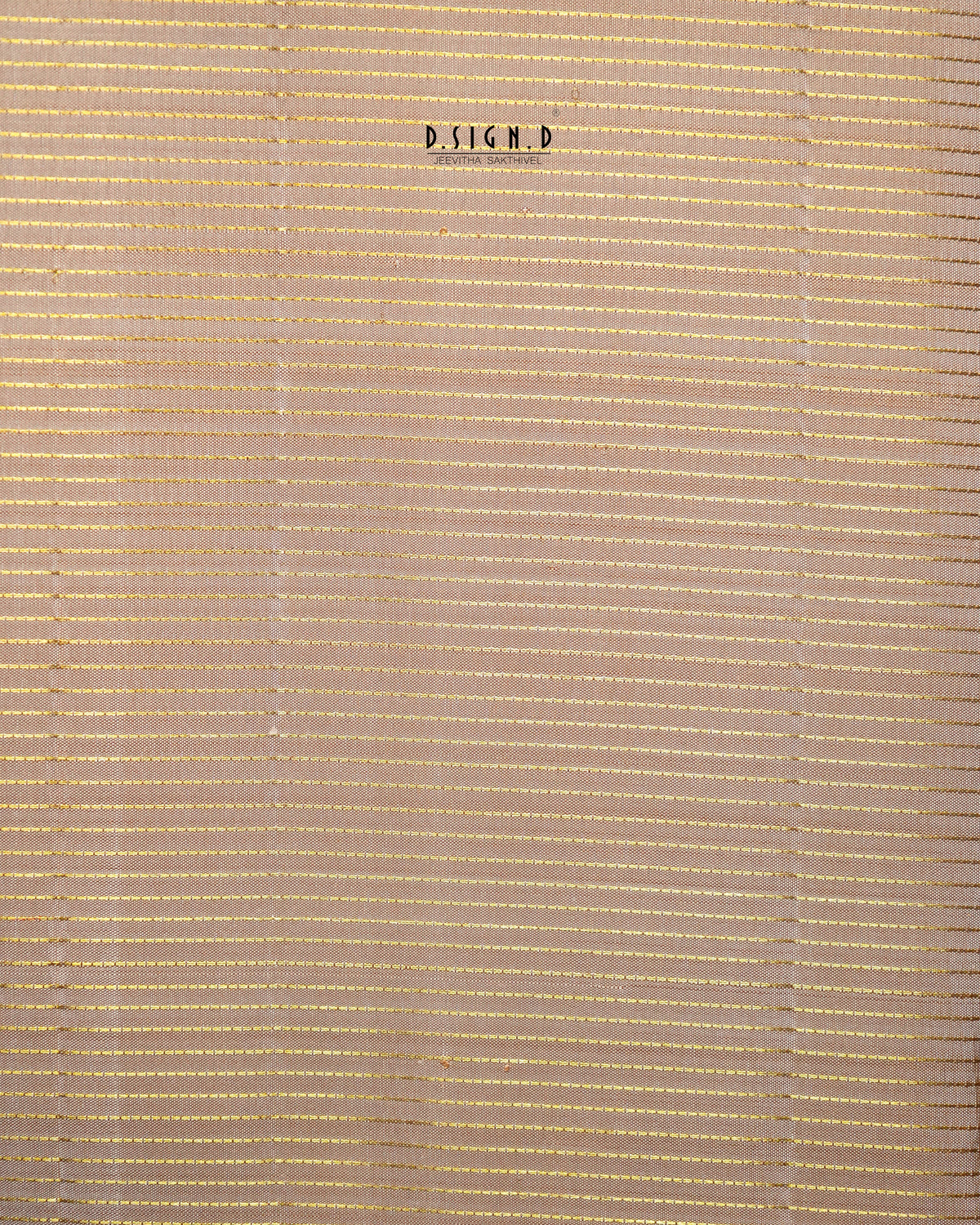 A close-up of a woven or slatted material in a warm beige/tan tone, with thin horizontal and vertical lines creating a textured pattern. 