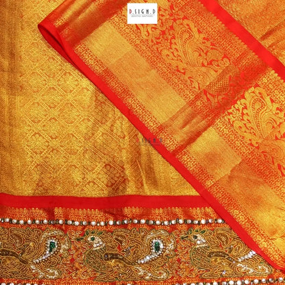 Gold Kanjeevaram embroidered silk saree