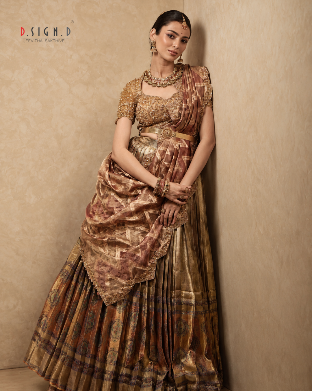 Aadhira gold silk half saree set with Zardozi embroidered blouse