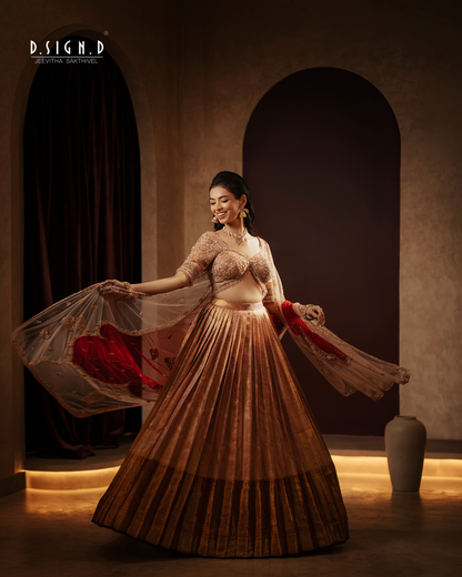 Aadhira peach and red silk half saree set with embroidered blouse